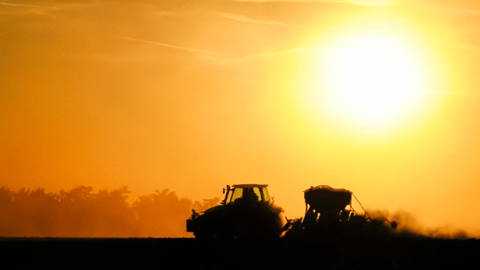 tractor working on a farm