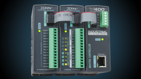 ControlByWeb X-400 with daisy-chain cables attaching two expansion modules, the X-17s and X-22s.